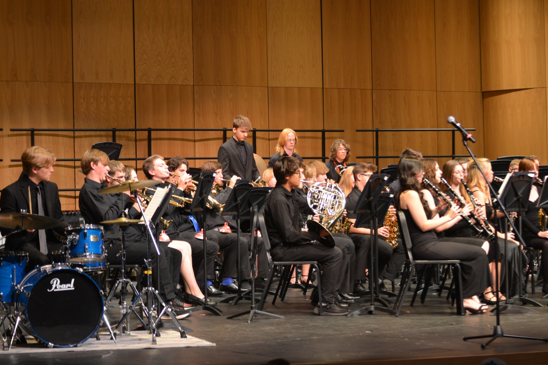 Sartell concert band performing on stage